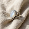 Oval Moonstone Ring with Swirl Band
